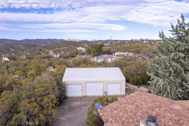 drone / aerial view featuring a mountain view