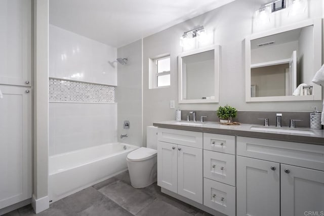 full bath featuring  shower combination, visible vents, a sink, and toilet