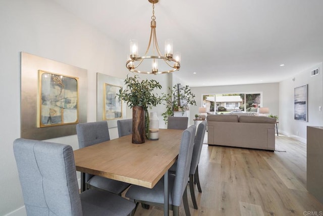 dining room with recessed lighting, visible vents, baseboards, light wood finished floors, and an inviting chandelier