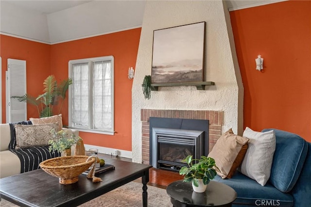 interior space with a brick fireplace