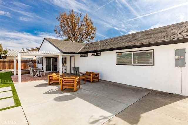 back of property featuring a shingled roof, a patio, fence, an outdoor living space, and stucco siding