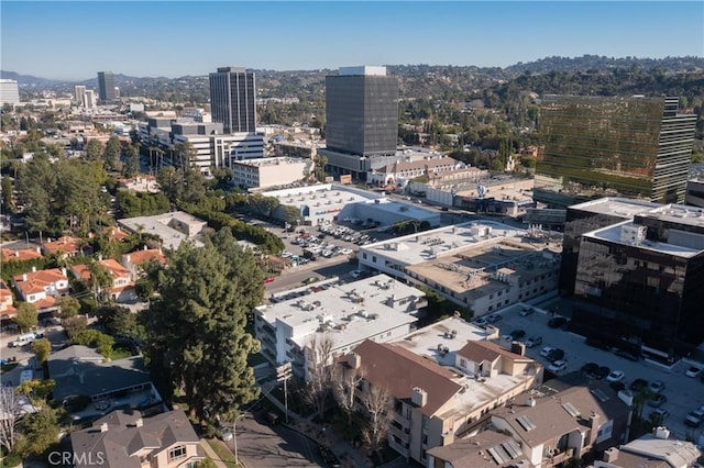 birds eye view of property with a city view