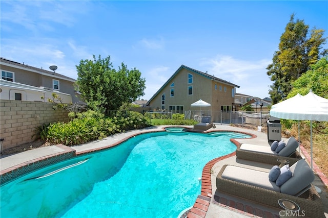 view of pool with a patio area, a fenced backyard, and a fenced in pool