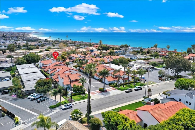 bird's eye view featuring a residential view and a water view