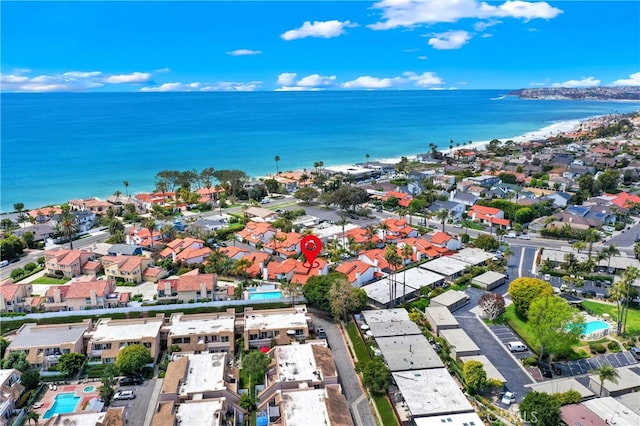 bird's eye view with a water view and a residential view