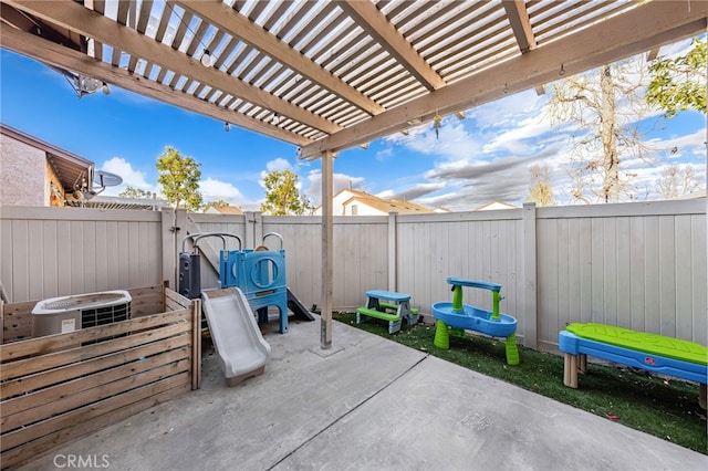 view of patio / terrace with central AC unit and a fenced backyard