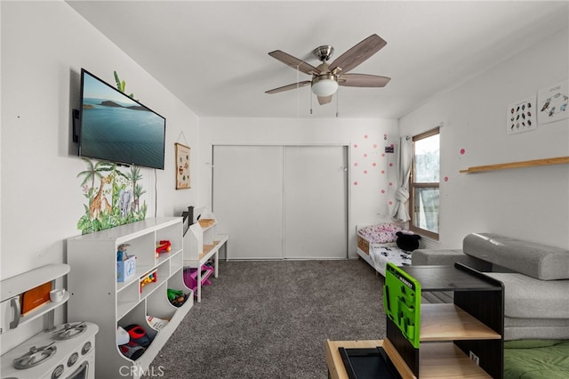 game room with carpet floors and ceiling fan