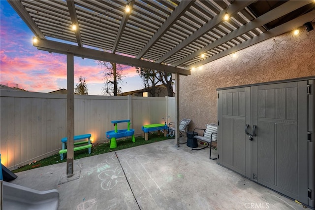 view of patio with a fenced backyard and a pergola