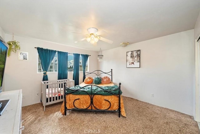 bedroom featuring carpet and ceiling fan