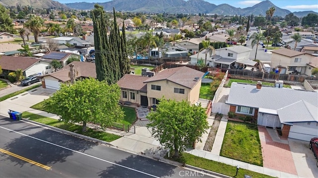 bird's eye view with a mountain view and a residential view