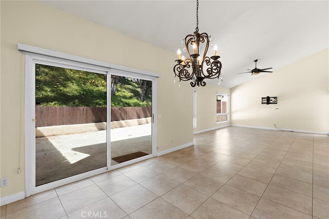 interior space featuring lofted ceiling, light tile patterned floors, and baseboards