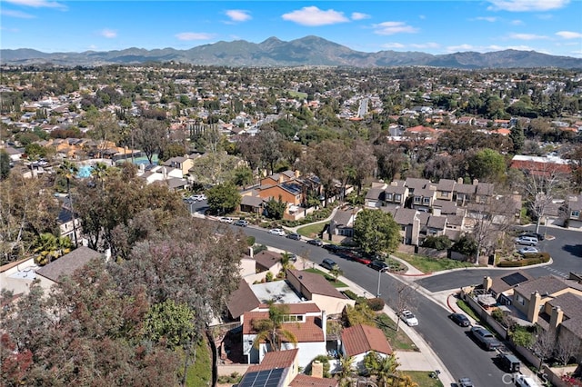 birds eye view of property featuring a residential view and a mountain view