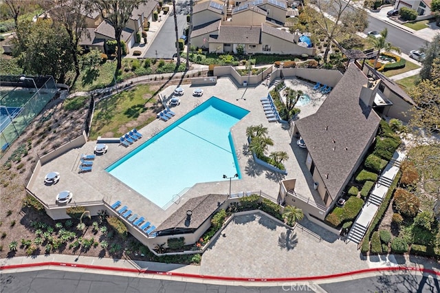 birds eye view of property with a residential view