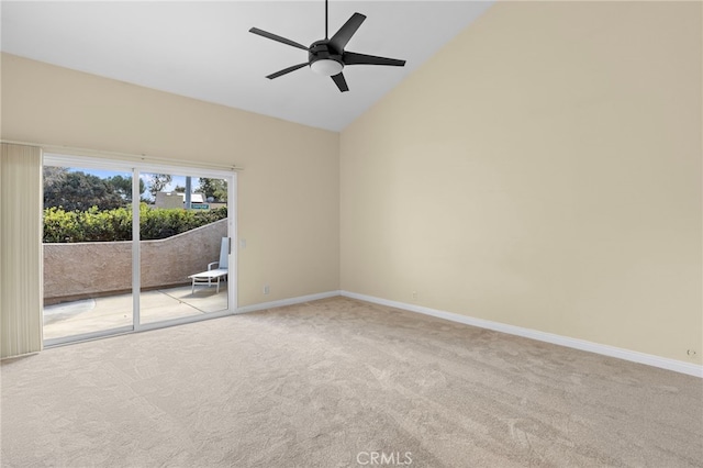 carpeted spare room with high vaulted ceiling, a ceiling fan, and baseboards