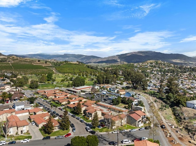 aerial view with a mountain view and a residential view