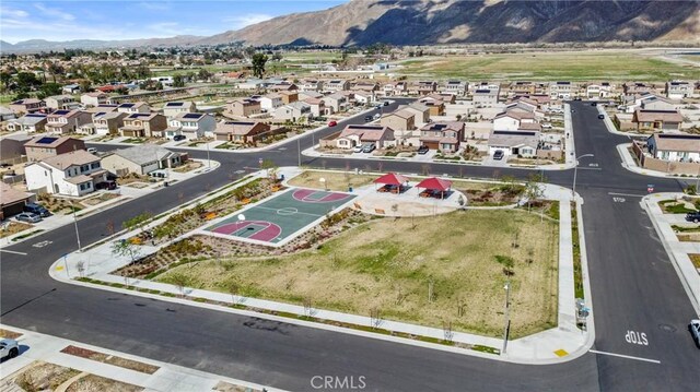 aerial view featuring a residential view and a mountain view