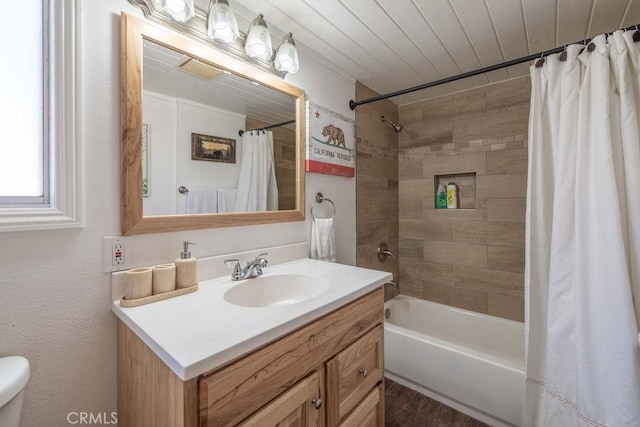 full bathroom featuring wooden ceiling, shower / tub combo with curtain, vanity, and toilet