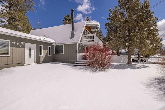 view of snow covered property