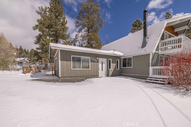 view of snow covered property