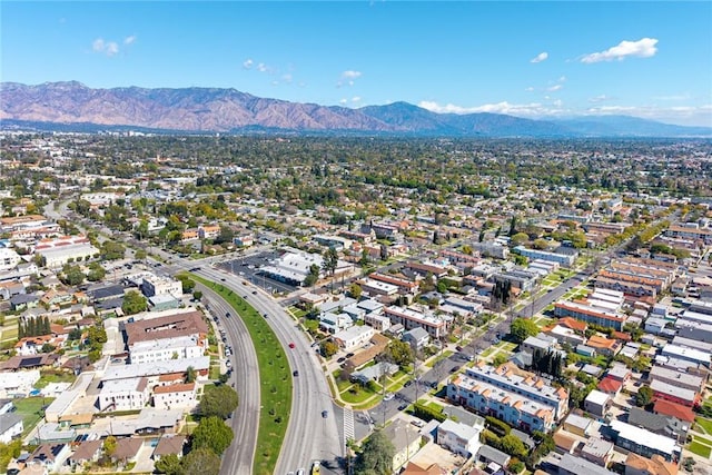 drone / aerial view featuring a mountain view