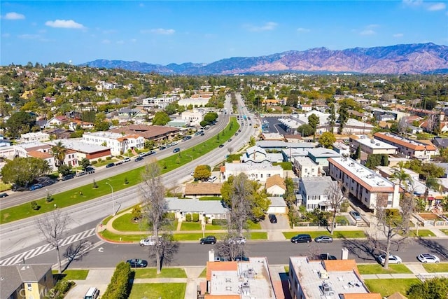 drone / aerial view with a residential view and a mountain view