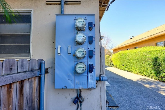 details with electric meter and stucco siding