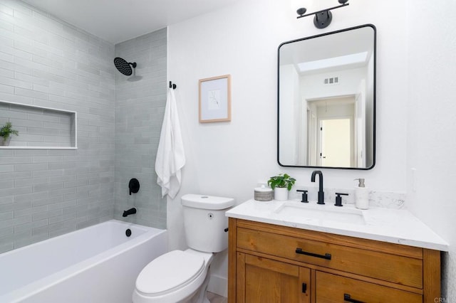 full bath with visible vents, tub / shower combination, vanity, and toilet