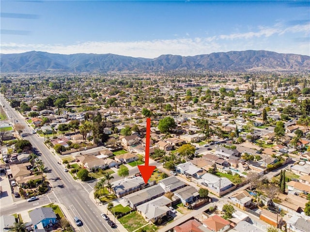 aerial view featuring a residential view and a mountain view