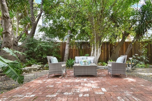 view of patio / terrace featuring fence private yard and outdoor lounge area