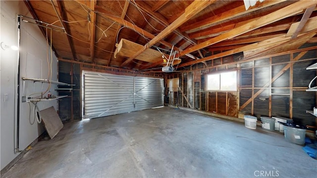 garage featuring a garage door opener