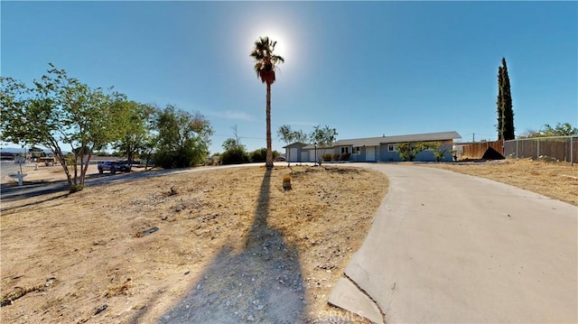 view of front of house with fence