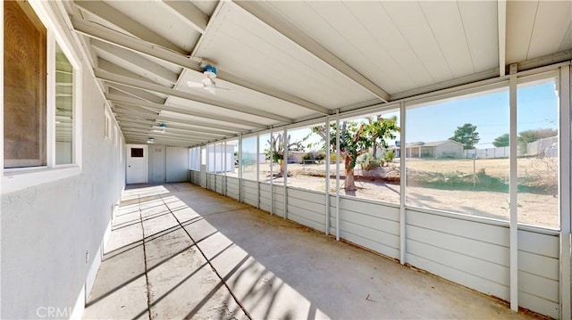 unfurnished sunroom featuring plenty of natural light