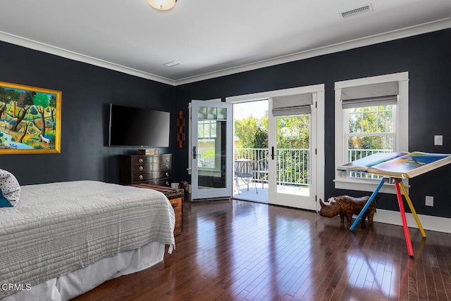 bedroom with wood-type flooring, visible vents, access to outside, and french doors