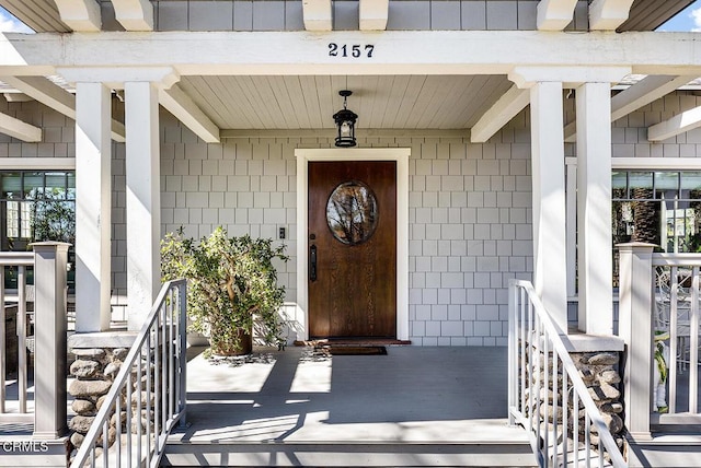 entrance to property with a porch