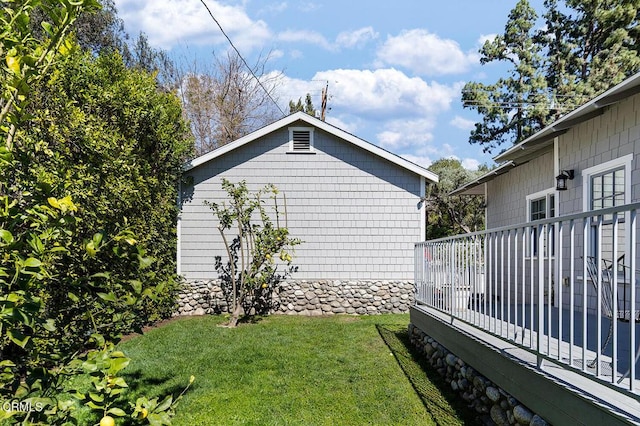 view of home's exterior with a lawn