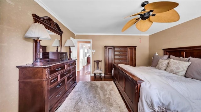 bedroom featuring dark wood-style floors and crown molding