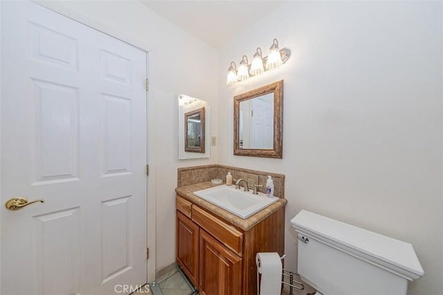 45544 Pine River Rd, Ahwahnee, CA 93601 - bathroom featuring vanity, toilet, and tile patterned floors