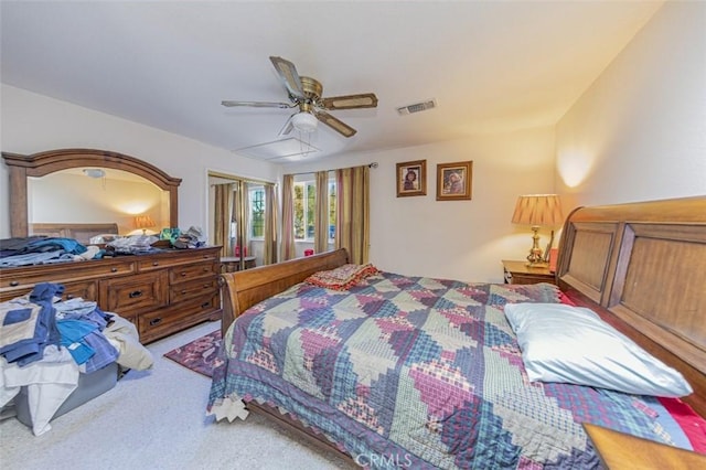 45544 Pine River Rd, Ahwahnee, CA 93601 - carpeted bedroom with visible vents and a ceiling fan
