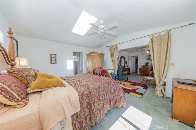45544 Pine River Rd, Ahwahnee, CA 93601 - carpeted bedroom with lofted ceiling with skylight and a ceiling fan