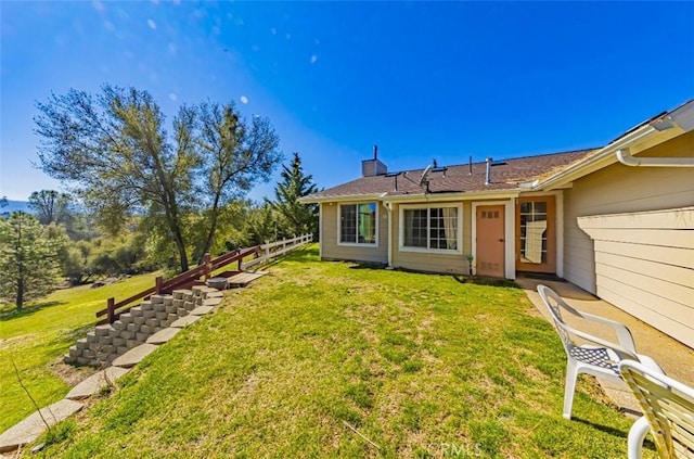 45544 Pine River Rd, Ahwahnee, CA 93601 - exterior space featuring a chimney, fence, and a yard