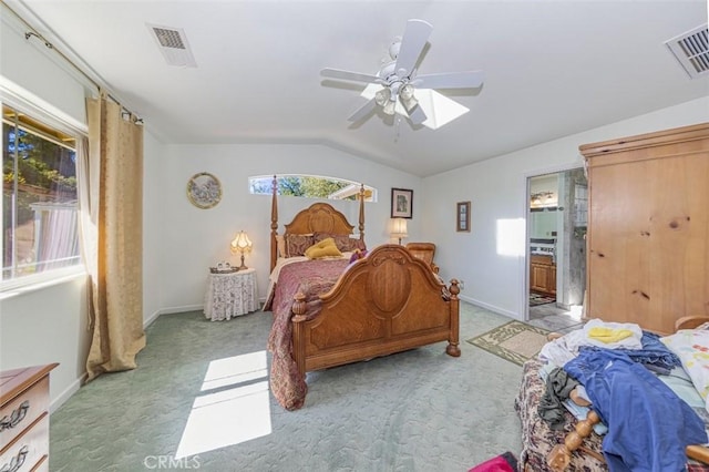45544 Pine River Rd, Ahwahnee, CA 93601 - bedroom featuring lofted ceiling, visible vents, light carpet, and baseboards