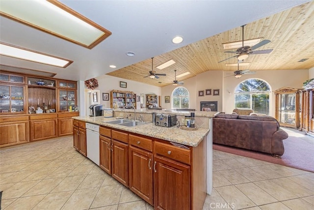 45544 Pine River Rd, Ahwahnee, CA 93601 - kitchen featuring dishwasher, wooden ceiling, open floor plan, a sink, and light tile patterned flooring