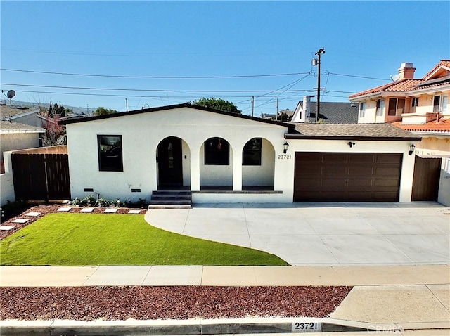 view of front of property with a porch, driveway, crawl space, stucco siding, and a front yard