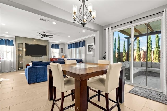 dining room featuring light tile patterned floors, visible vents, recessed lighting, crown molding, and ceiling fan with notable chandelier