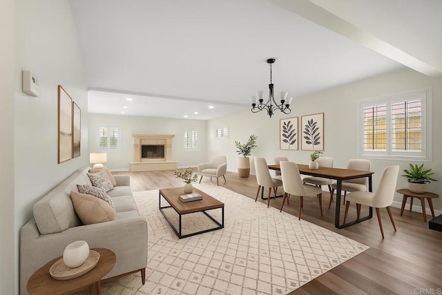 1331 Louden Ln, Imperial Beach, CA 91932 - living area featuring recessed lighting, light wood-type flooring, a chandelier, and a fireplace