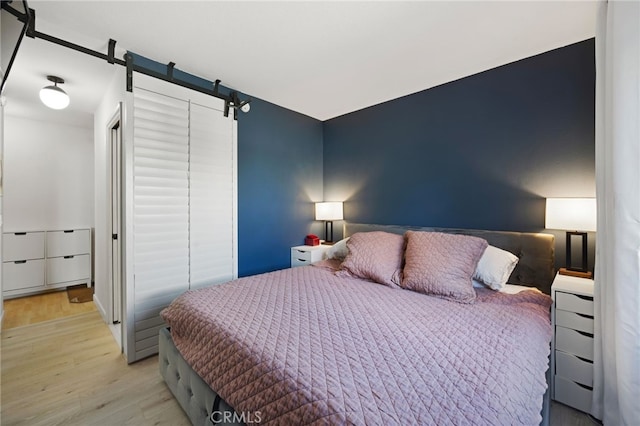 bedroom featuring light wood-type flooring