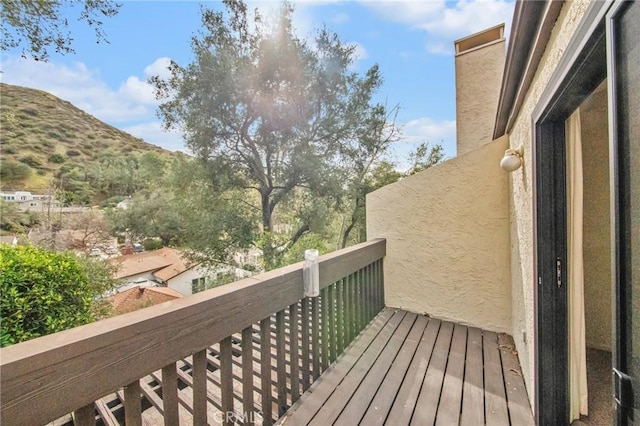 balcony featuring a mountain view