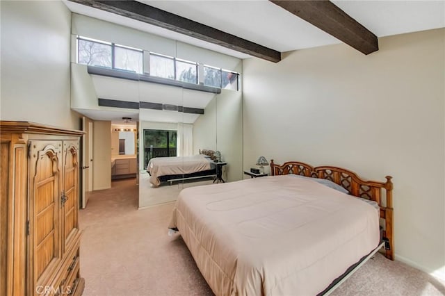 bedroom featuring light carpet, beamed ceiling, and multiple windows