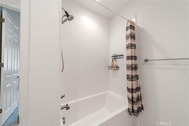 full bath featuring shower / bath combination with curtain