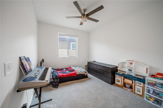 carpeted bedroom with a ceiling fan